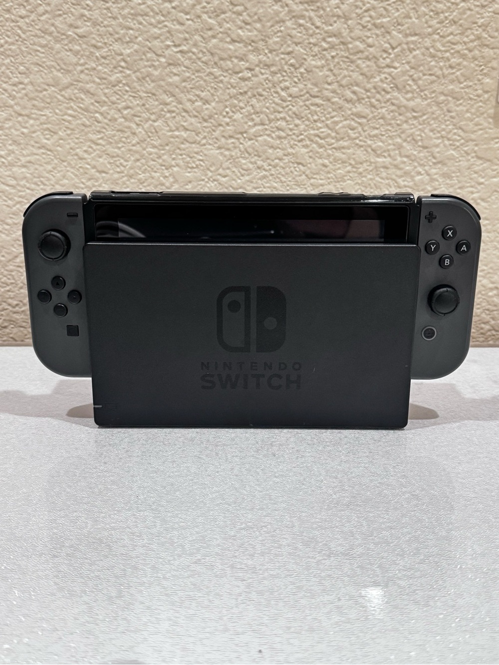 Nintendo Switch Console with Black Dock and Gray Joy‑Con Controllers
